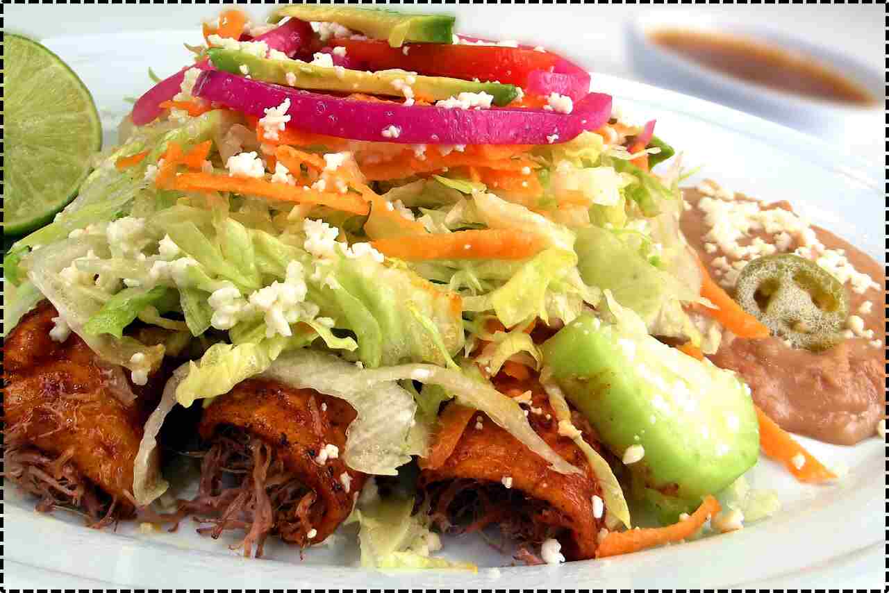 Colorful Mexican salad with a variety of fresh vegetables and crunchy snacks